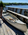 Mirro Craft Aluminum 15’ Canoe with three wooden paddles and side mount for motor - [click here to zoom]
